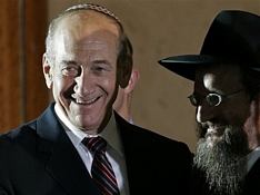 Hizbullah'a Mağlup Olan Olmert "göreve devam" dedi