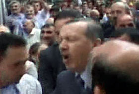 Başbakan Erdoğan'ın karnına yumruk