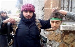 Alnında “Rukayye Bintü’l Hüseyin” yazılı gencin başını kestiler - FOTO